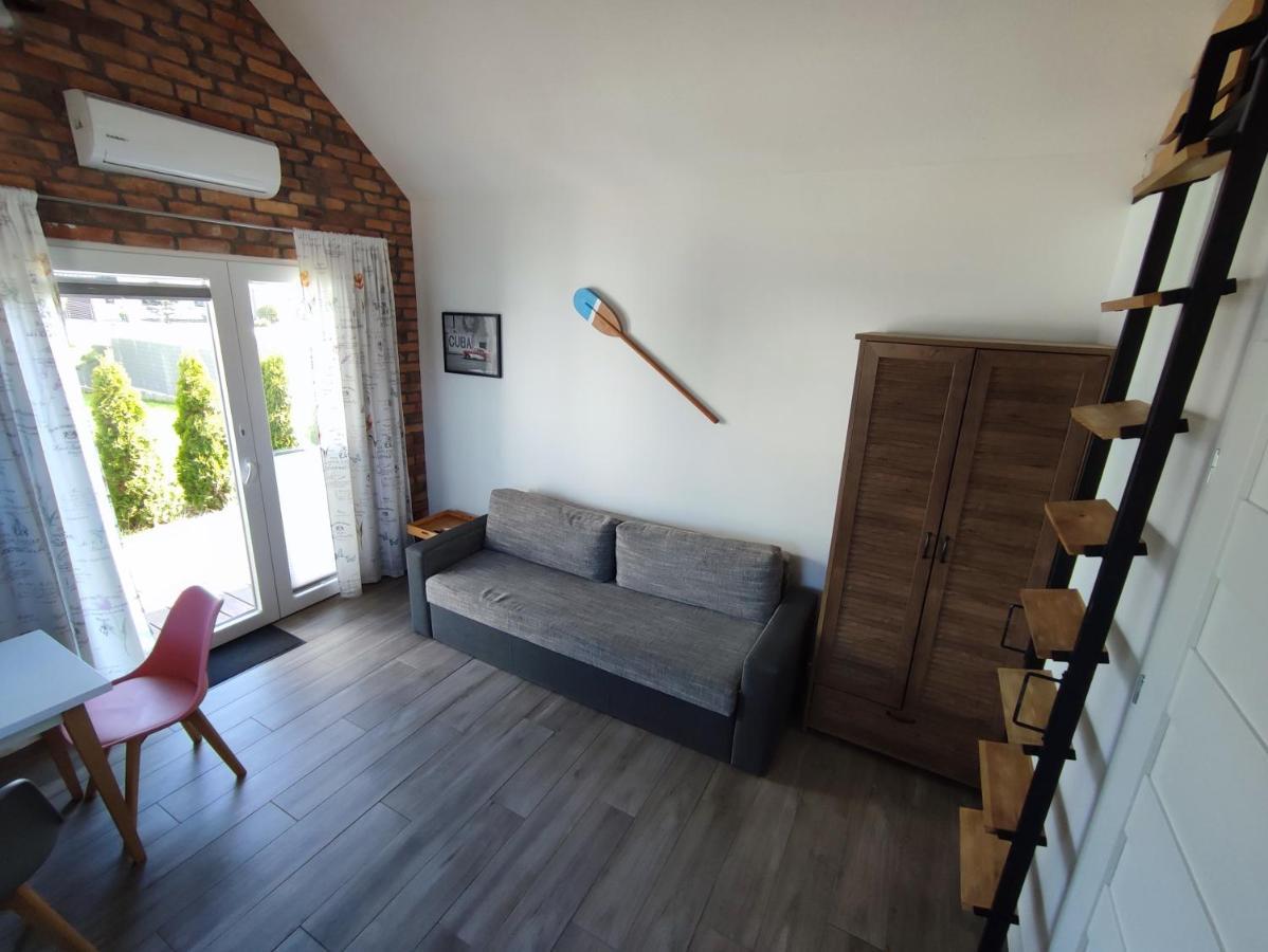SOWI KĄT domki i apartamenty Mikołajki Bagian luar foto