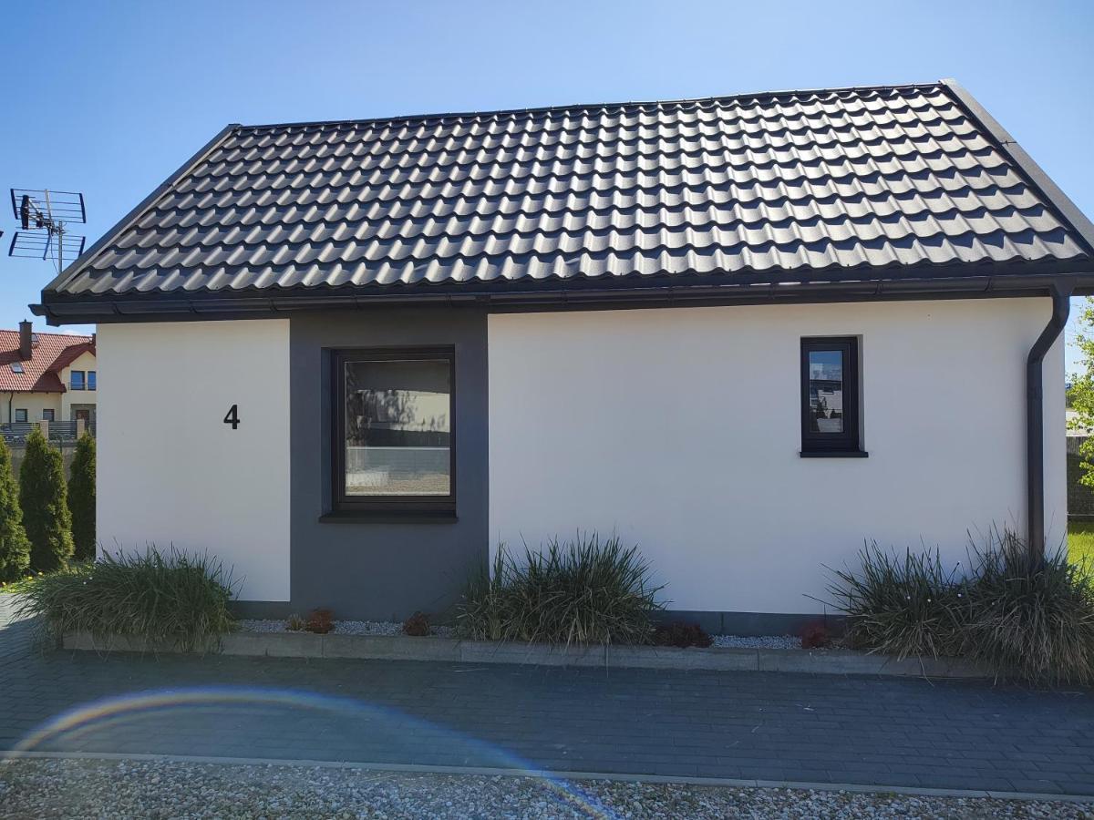 SOWI KĄT domki i apartamenty Mikołajki Bagian luar foto