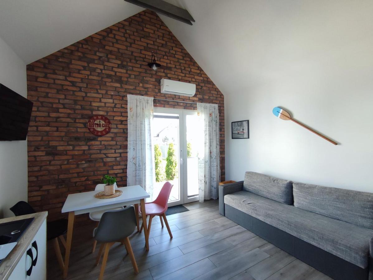 SOWI KĄT domki i apartamenty Mikołajki Bagian luar foto